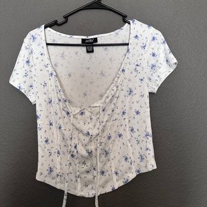 White Floral Crop Top. Ties in the front. Size L